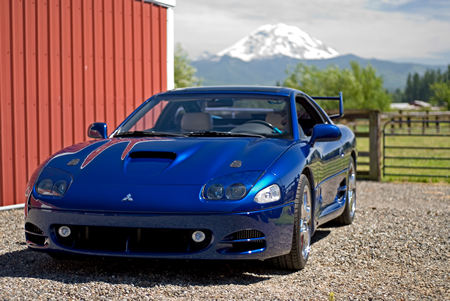 Danube Pearl Blue 3000GT - 1995 w/ custom carbon fiber hood, PIAA driving lights, and 99 rear spoiler swap out.